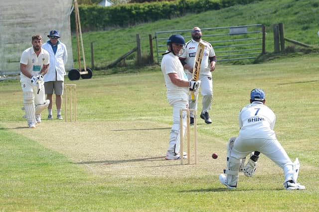 Cloughton batsman Liam Salt looks back at the Scarborough Hospital keeper. Photo by Richard Ponter