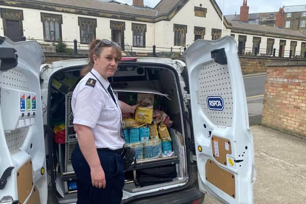RSPCA inspector Laura Barber delivering to the Rainbow Centre in Scarborough.
