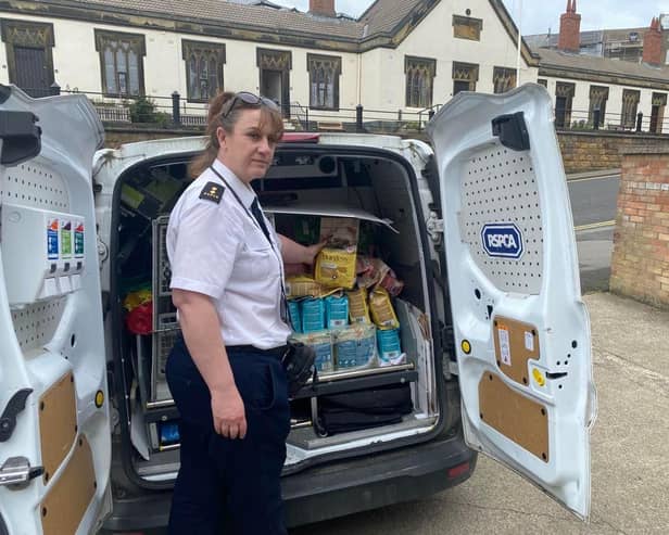 RSPCA inspector Laura Barber delivering to the Rainbow Centre in Scarborough.