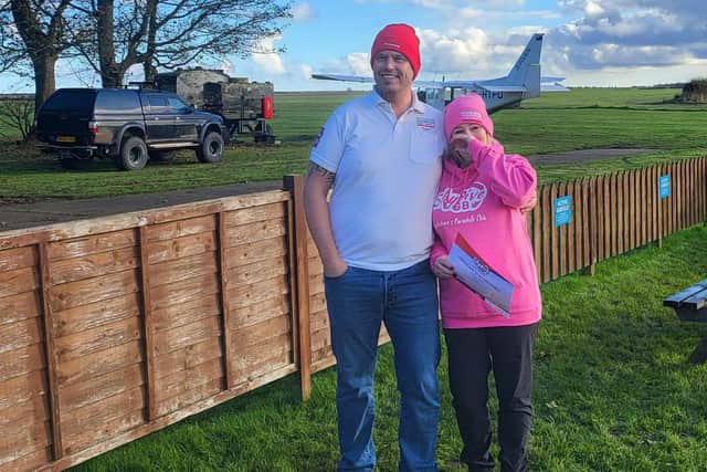 Nat Hansell with her brother Lee Waring - Waring Building and Roofing made a donation towards her total.