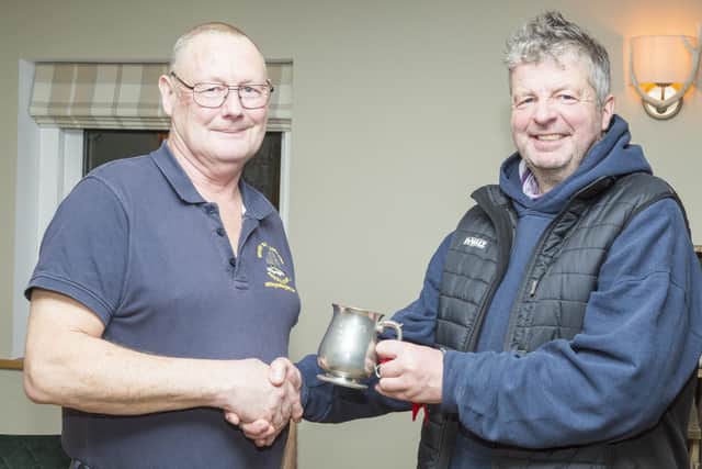 Peter Horbury presenting the Secretary’s Challenge Trophy to Mark Stonehouse, secretary of Cloughton Rocks.