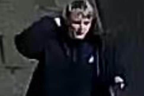 CCTV image of a man police need to speak to in connection with a vehicle criminal damage investigation in Whitby.