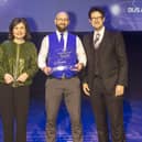 Coastliner bus driver Mariusz Losinski (centre) with his Gold award as Top National Bus Driver. BBC News presenter Jane Hill (left) presented the awards in a glittering ceremony in London, with Robert Jack (right) Managing Editor of award sponsor Passenger Transport.
