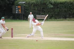 Pocklington's Joel Taylor smashes his side's total beyond 300.as they won by 213 runs at home to Hornsea. PHOTO BY PHIL GILBANK