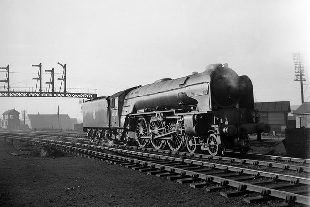 Class A1 Pacific "Foxhunter". Blue livery, No. 60134, stovepipe chimney. Reversing into Copley Hill for Holbeck High Level Station. November 22, 1951.