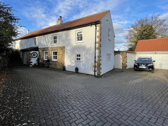 There is plenty of driveway parking with the house, and a double garage.