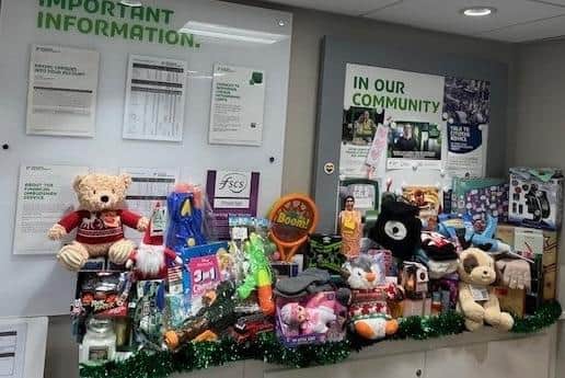 The gifts included children’s toys, perfume for seniors, festive treats, toiletries, and warm winter essentials.