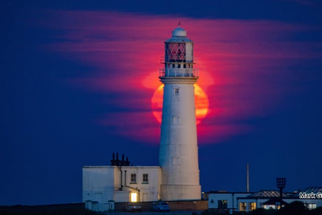 Mark Griffiths took this lighthouse photo, complete with strawberry moon.