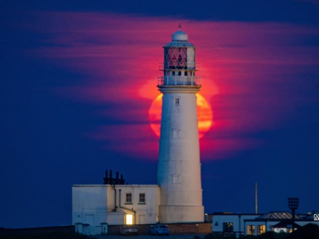 Mark Griffiths took this lighthouse photo, complete with strawberry moon.