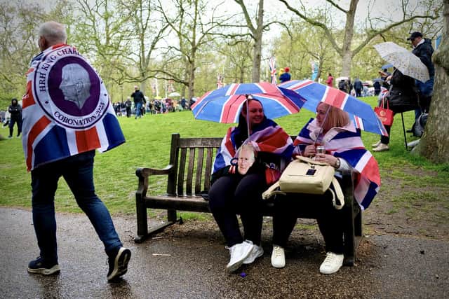 Members of the public in Coronation and Union Jack attire in St. James's park. Image: Simon James Smith