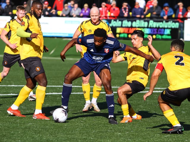 Boro defender Kieran Weledji is outnumbered by Rushall players