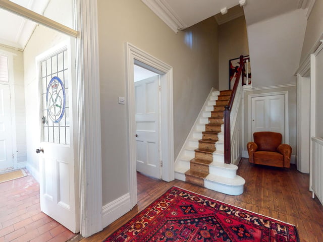 The property has a bright and spacious hallway.
