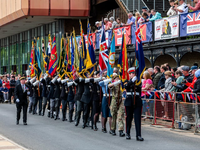 Standard-bearers line up for the start of the Scarborough Armed Forces Day.