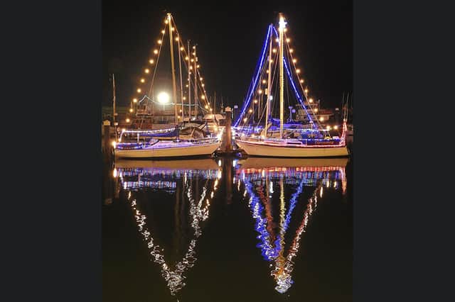 Scarborough harbour yachts lit up for Christmas - Image credit: Scarborough Porpoise