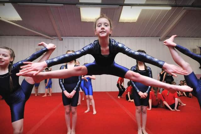 Friarage School gymnasts warm up for the main event. Pictures: Richard Ponter 			  161018a