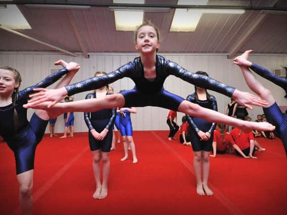 Friarage School gymnasts warm up for the main event. Pictures: Richard Ponter 			  161018a