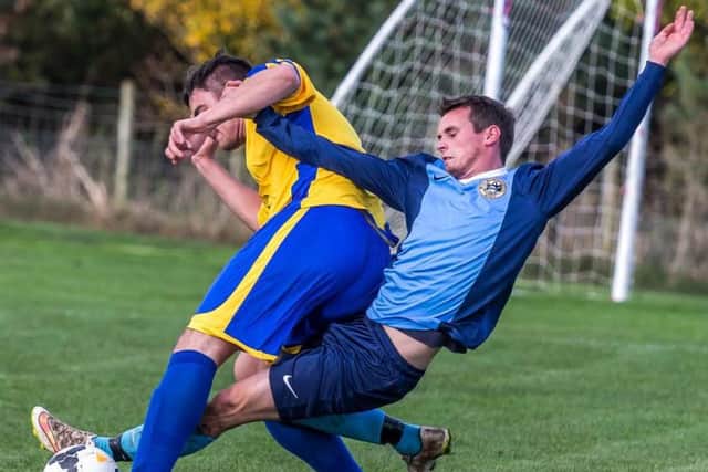 Whitby Fishermen and Filey Town get stuck in during their cup clash