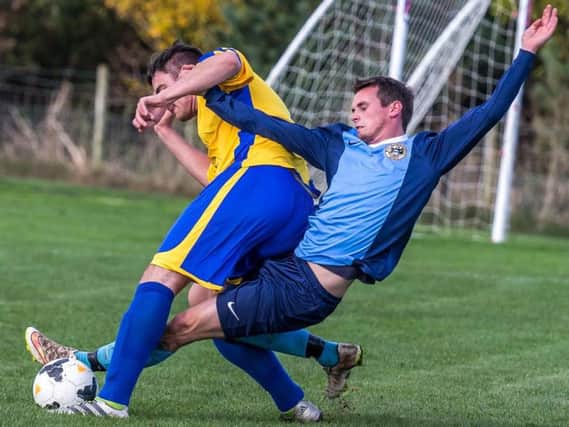 Whitby Fishermen and Filey Town get stuck in during their cup clash