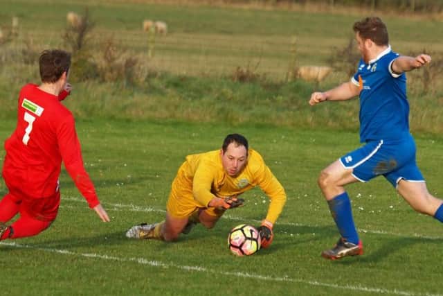 Ayton try to clear their lines at Edgehill 3rds. Picture: Steve Lilly.