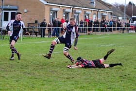 Scarborough charge clear of Hullensians. Picture: Andy Standing.