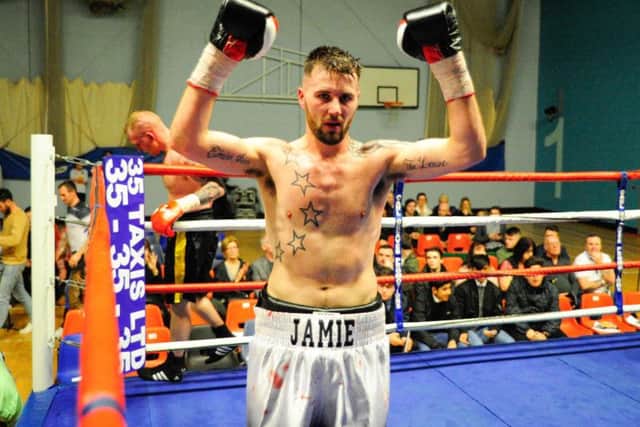 Jamie Scotter celebrates his win
