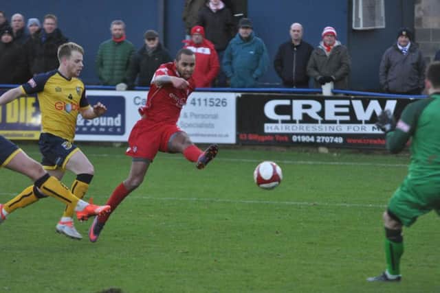 Jacob Hazel lets fly against Tadcaster