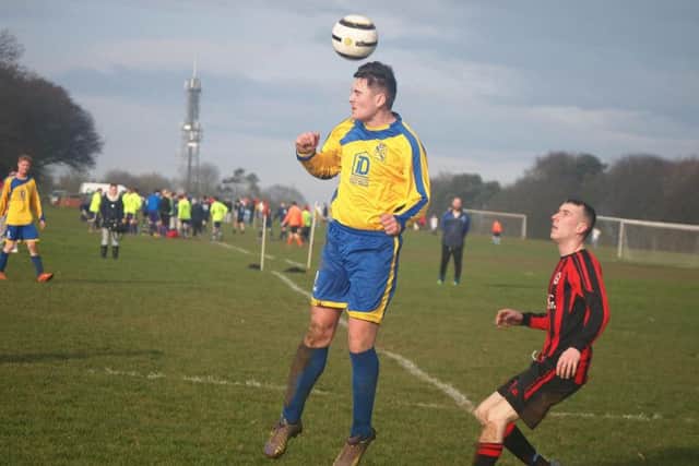 Filey Town Reserves win a header during their 4-1 win against West Pier Reserves at Oliver's Mount. Picture by Steve Lilly.