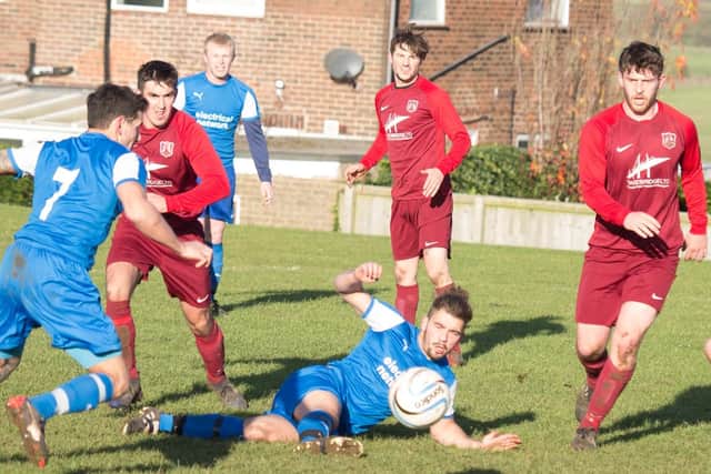 Traf get a strike in on the Angel goal. Pictures by Steve Lilly.