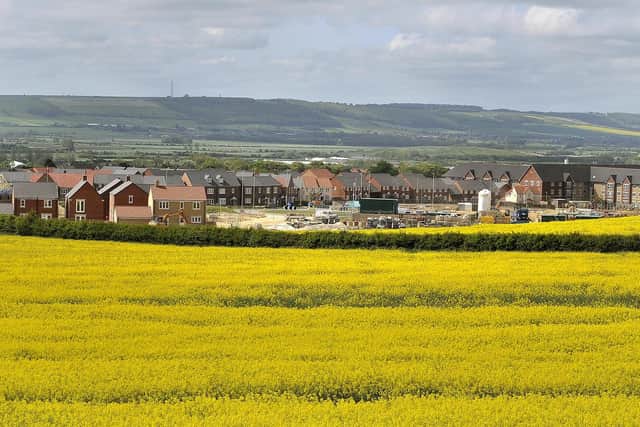 A view of the new homes with Eastfield and the wolds in the distance.