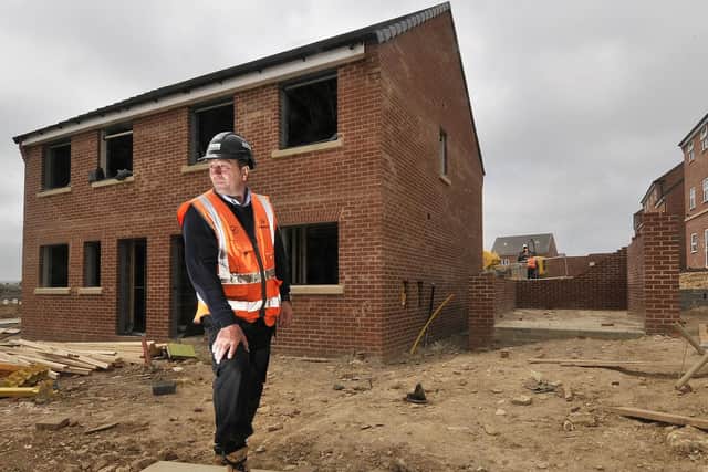 Keepmoat Homes in Scarborough. Site Manager Chris Smart outside one of the newly constructed properties.