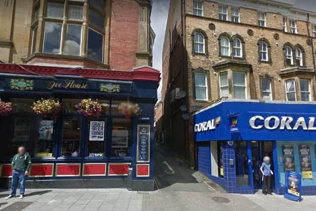 The mobility scooter was stolen from a yard outside the owner's flat in the alleyway between the Lord Roseberry pub and Coral in Scarborough. Picture: Google