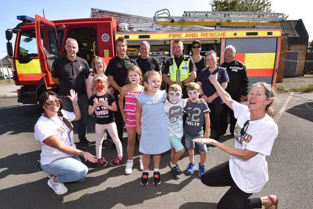 Organisers ,Scarborough fire service and Police representatives and kids enjoy the afternoon.