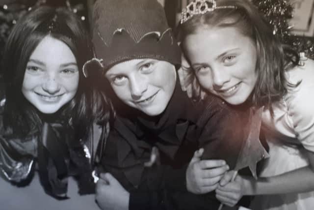 Dressing up for the Christmas fair at Barrowcliff Infant School: Jody Brown, Daniel Wilcock and Carrie-Ann I'Anson.