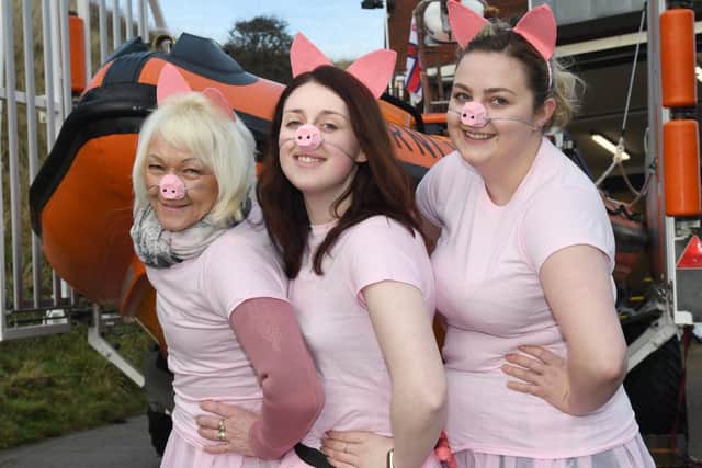 Pre-school staff Maria Murray, Catrina Golden and Shannon Anderson as the Three Little Pigs.