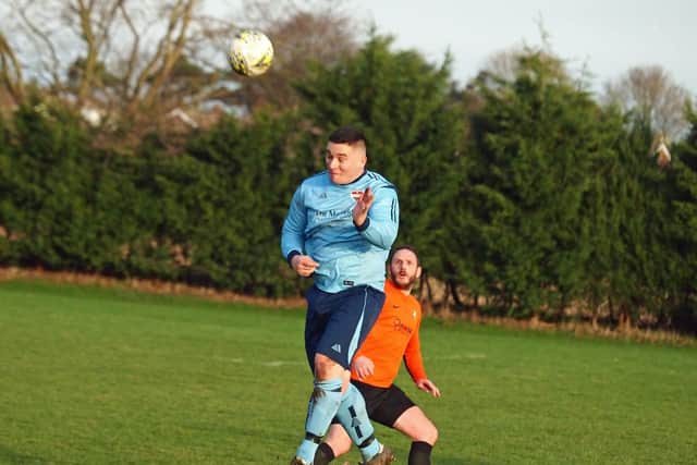 Seamer win a header during their disappointing 6-0 defeat to home to Edgehill
