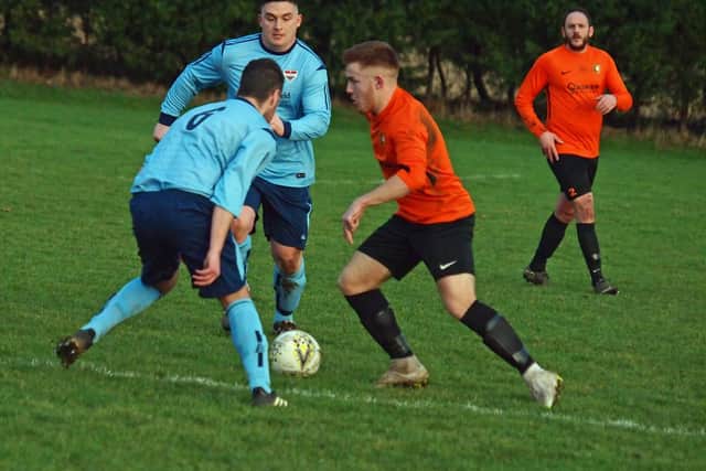 Tyson Stubbings searches for a gap in the Seamer defence