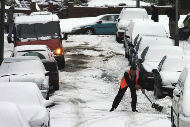 A postman struggles to negotiate Highfield with his van in November 2005
