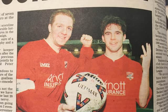 Boro's hat-trick hero Simon Betts receives the match ball from skipper Gareth Stoker after bagging three against Stocksbridge