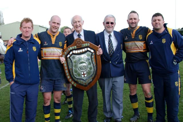 Ernie celebrating a Yorkshire Shield win with Bridlington RUFC officials and coaches.