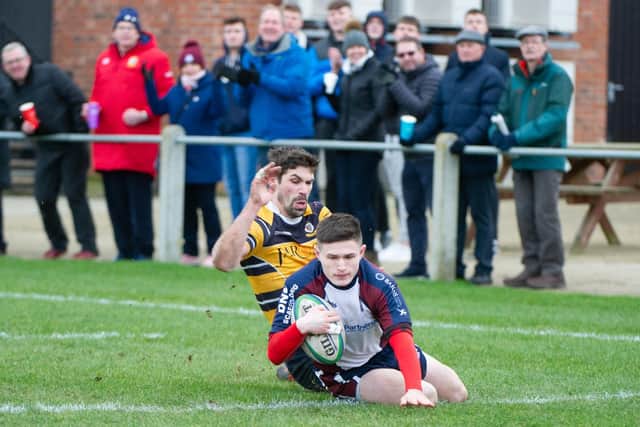 Jonty Holloway crashes over the whitewash