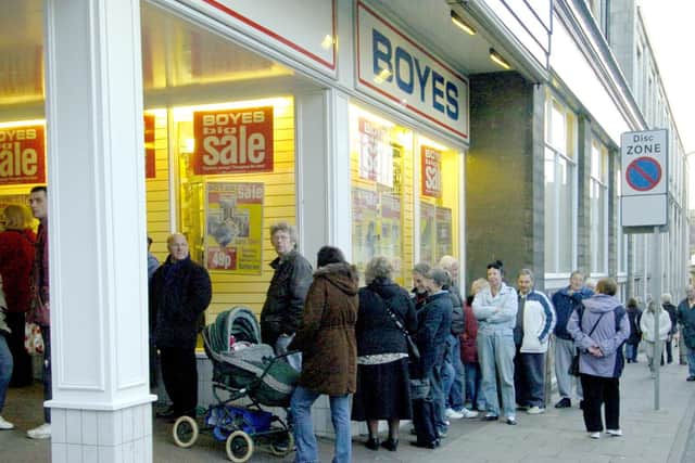 Sales shoppers pictured 12 years ago.