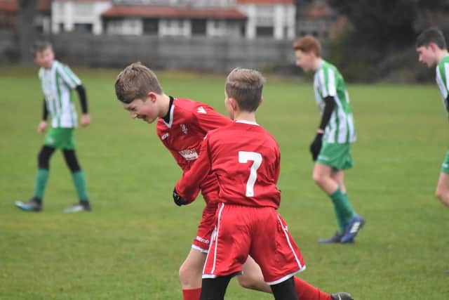 Boro Under-14s celebrate scoring in their defeat against Ferriby