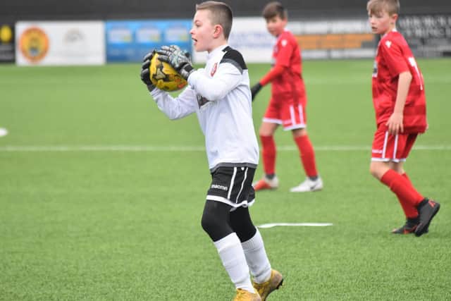 Boro Under-11s keeper shows a safe pair of hands