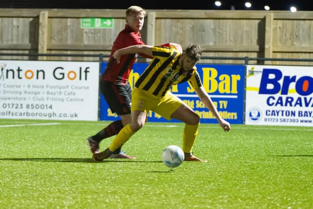 Robbie Scarborough fights for possession