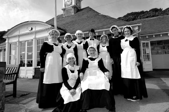 2013, and the staff wear clothing of a century earlier to mark the cafe's 100th anniversary