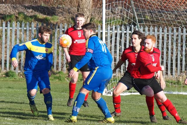 Kris Tate and Gary Lawton try to find space in the Filey box
