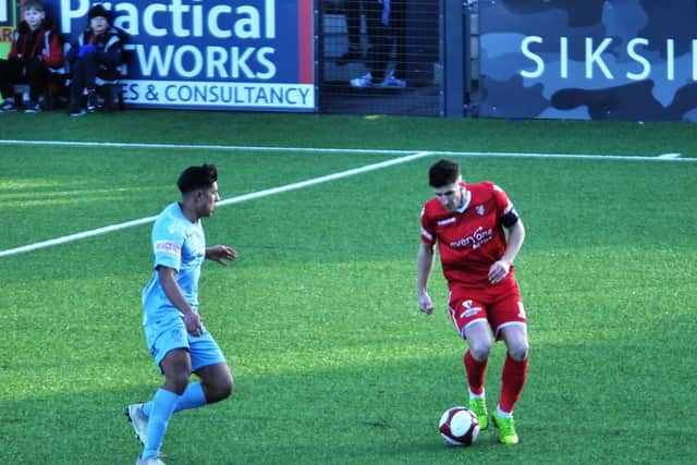 Michael Coulson on the ball