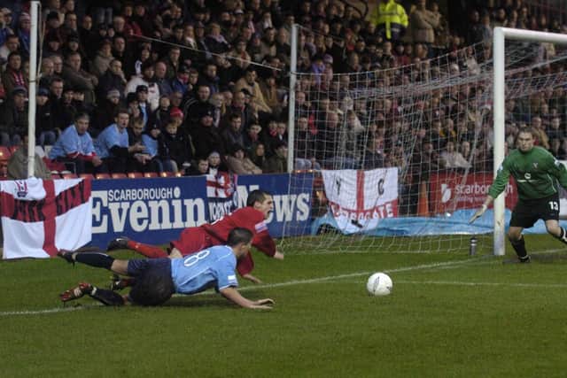Chris Senior is brought down in the box