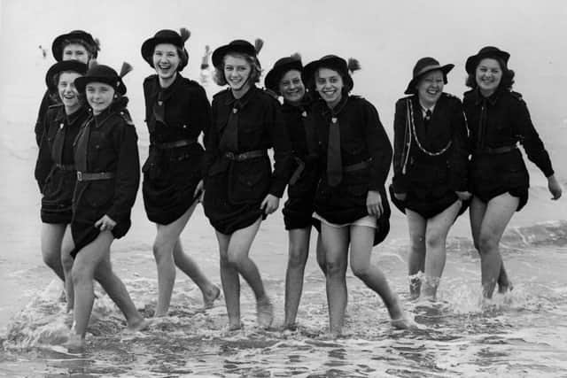 Girls of the 7th Manchester Regiment Church Girls Brigade (Rochdale Battalion) who were in camp at Bridlington, making the most of their holiday by the sea, in August 1939.