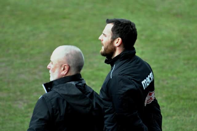 Boss Steve Kittrick and assistant Chris Bolder look on